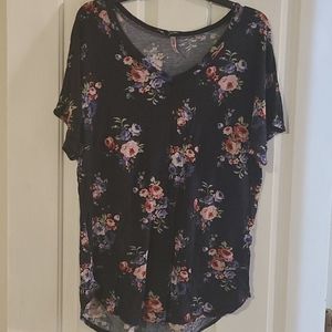 Short sleeve floral shirt. Gently used
